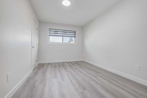 152 Falconridge Crescent Ne, Calgary, AB - Indoor Photo Showing Other Room