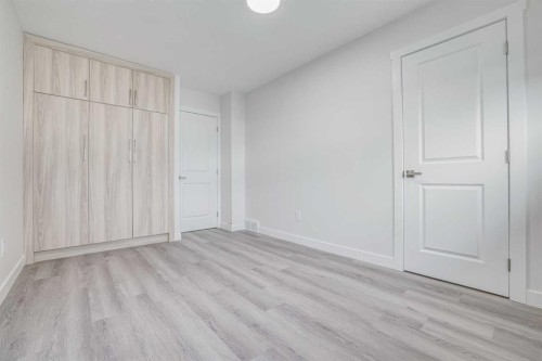 152 Falconridge Crescent Ne, Calgary, AB - Indoor Photo Showing Other Room