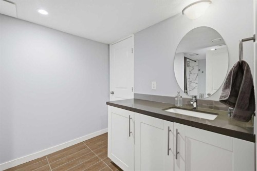 348 Powell Street, Cochrane, AB - Indoor Photo Showing Bathroom