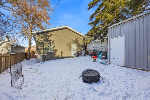 348 Powell Street, Cochrane, AB - Outdoor With Exterior