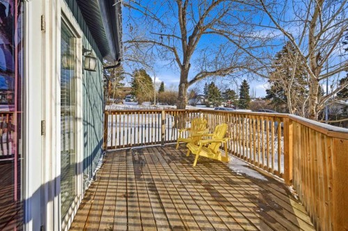 348 Powell Street, Cochrane, AB - Outdoor With Deck Patio Veranda
