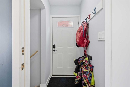 348 Powell Street, Cochrane, AB - Indoor Photo Showing Other Room