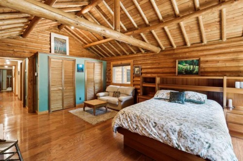 67 Bracken Point, Bragg Creek, AB - Indoor Photo Showing Bedroom