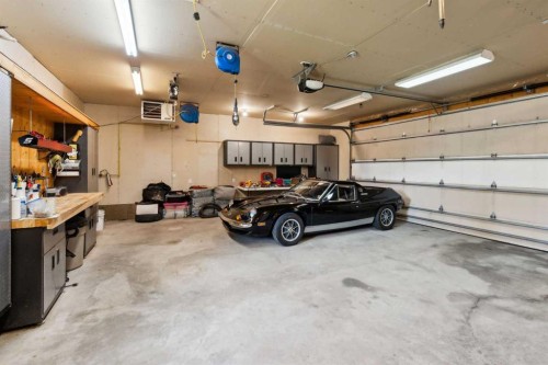 67 Bracken Point, Bragg Creek, AB - Indoor Photo Showing Garage