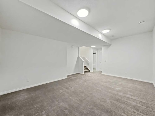 104 Masters Link Se, Calgary, AB - Indoor Photo Showing Other Room
