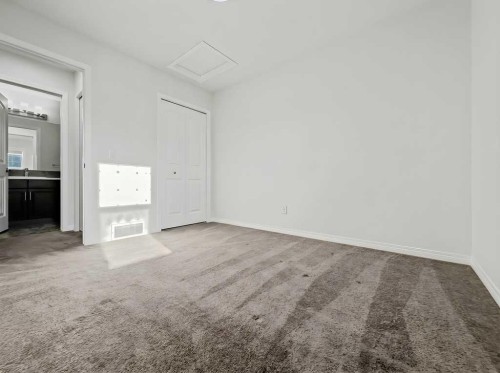 104 Masters Link Se, Calgary, AB - Indoor Photo Showing Other Room