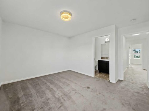 104 Masters Link Se, Calgary, AB - Indoor Photo Showing Other Room
