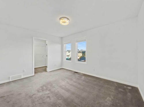 104 Masters Link Se, Calgary, AB - Indoor Photo Showing Other Room