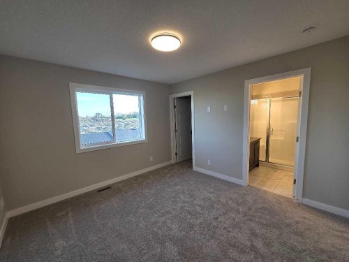 245 Cobblestone Gate Sw, Airdrie, AB - Indoor Photo Showing Other Room