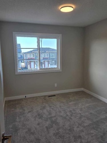 245 Cobblestone Gate Sw, Airdrie, AB - Indoor Photo Showing Other Room