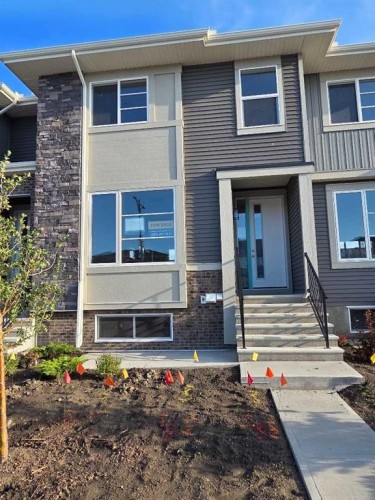 245 Cobblestone Gate Sw, Airdrie, AB - Outdoor With Facade