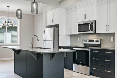 245 Cobblestone Gate Sw, Airdrie, AB - Indoor Photo Showing Kitchen With Stainless Steel Kitchen With Upgraded Kitchen