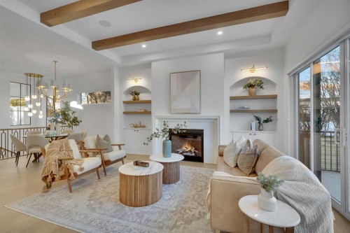 20 Roselake Street Nw, Calgary, AB - Indoor Photo Showing Living Room With Fireplace
