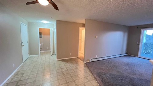 1208-12 Cimarron Common, Okotoks, AB - Indoor Photo Showing Other Room