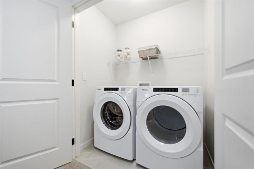 114 Wolf Creek Rise Se, Calgary, AB - Indoor Photo Showing Laundry Room