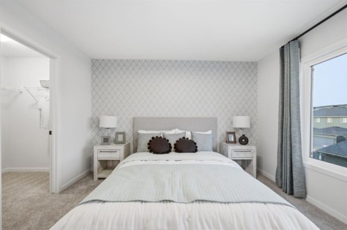 114 Wolf Creek Rise Se, Calgary, AB - Indoor Photo Showing Bedroom