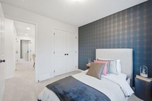 114 Wolf Creek Rise Se, Calgary, AB - Indoor Photo Showing Bedroom