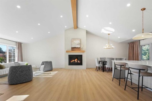 1016 Mapleglade Drive Se, Calgary, AB - Indoor With Fireplace