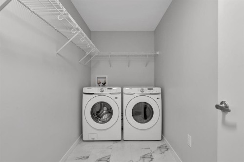2314-220 Seton Grove Se, Calgary, AB - Indoor Photo Showing Laundry Room