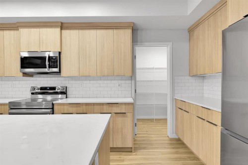 2314-220 Seton Grove Se, Calgary, AB - Indoor Photo Showing Kitchen