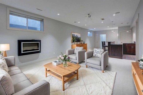 1410 26A Street Sw, Calgary, AB - Indoor Photo Showing Living Room With Fireplace