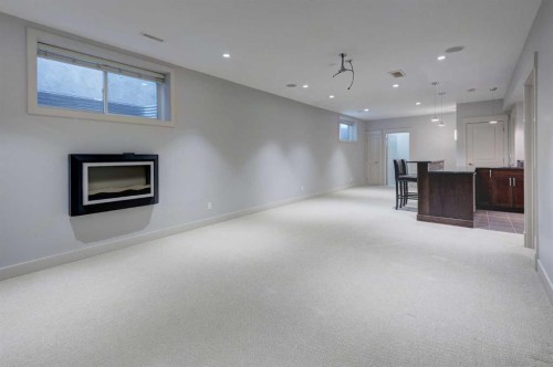 1410 26A Street Sw, Calgary, AB - Indoor With Fireplace