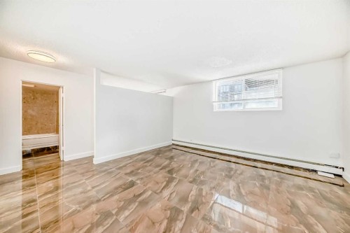 102-316 1 Avenue Ne, Calgary, AB - Indoor Photo Showing Other Room