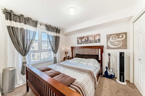 1303-279 Copperpond Common Se, Calgary, AB - Indoor Photo Showing Bedroom