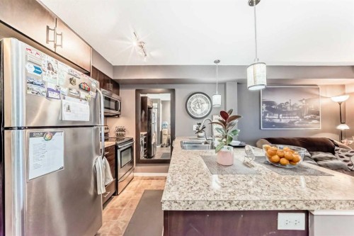 1303-279 Copperpond Common Se, Calgary, AB - Indoor Photo Showing Kitchen With Stainless Steel Kitchen With Double Sink With Upgraded Kitchen