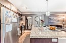1303-279 Copperpond Common Se, Calgary, AB  - Indoor Photo Showing Kitchen With Stainless Steel Kitchen With Double Sink With Upgraded Kitchen 