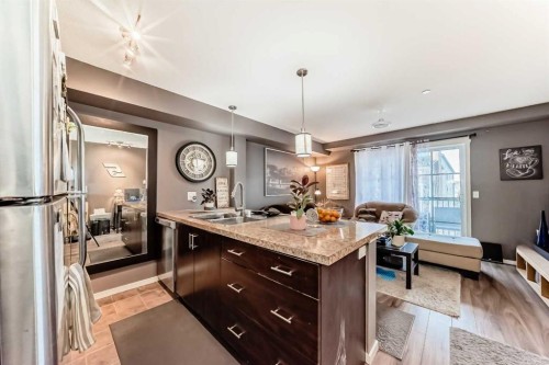1303-279 Copperpond Common Se, Calgary, AB - Indoor Photo Showing Kitchen With Double Sink