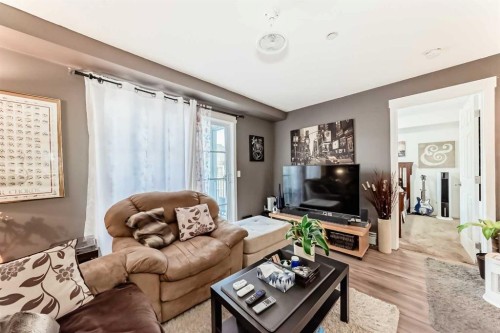1303-279 Copperpond Common Se, Calgary, AB - Indoor Photo Showing Living Room