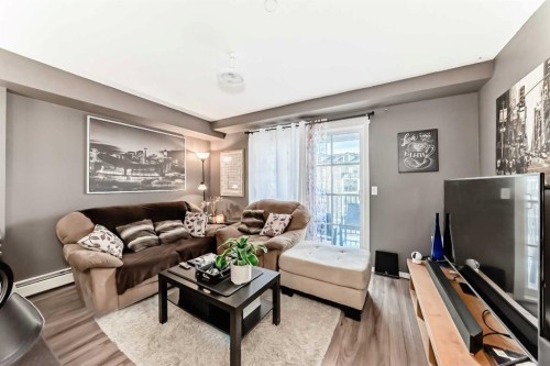 1303-279 Copperpond Common Se, Calgary, AB - Indoor Photo Showing Living Room