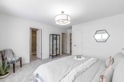 546 Rivercrest View, Cochrane, AB - Indoor Photo Showing Bedroom
