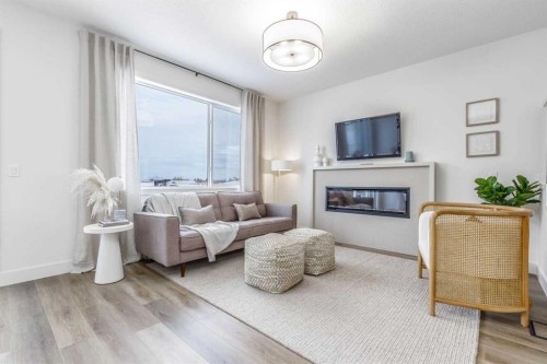 546 Rivercrest View, Cochrane, AB - Indoor Photo Showing Living Room With Fireplace
