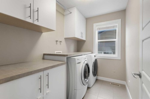 169 Aspen Hills Way Sw, Calgary, AB - Indoor Photo Showing Laundry Room