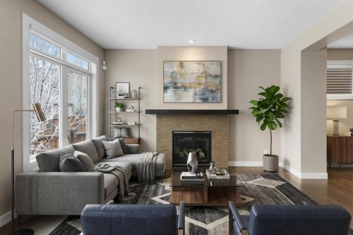 169 Aspen Hills Way Sw, Calgary, AB - Indoor Photo Showing Living Room With Fireplace
