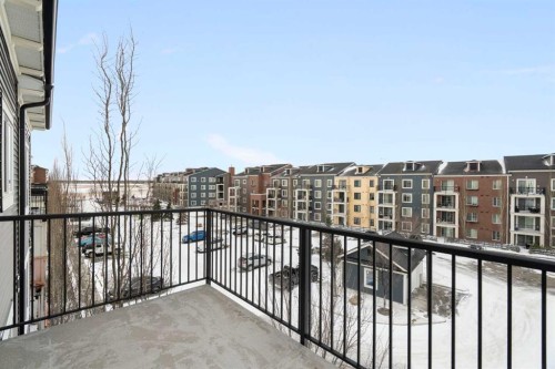 1411-99 Copperstone Park Se, Calgary, AB - Outdoor With Balcony With Exterior
