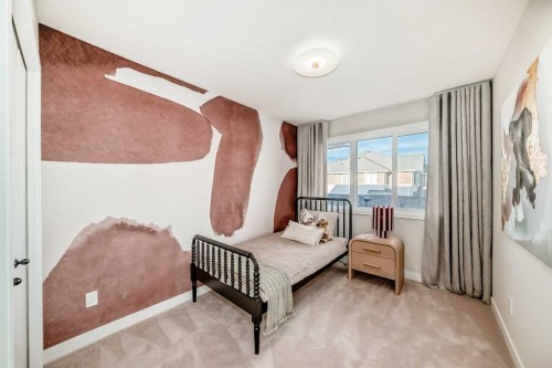 62 Clydesdale Avenue, Cochrane, AB - Indoor Photo Showing Bedroom