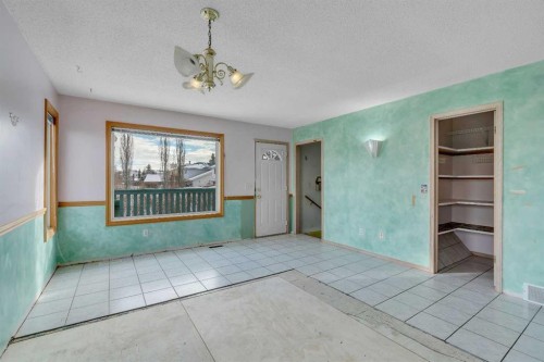 12 Hawkland Crescent Nw, Calgary, AB - Indoor Photo Showing Other Room