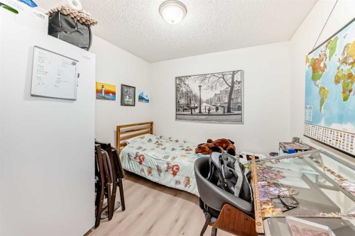 107-345 Rocky Vista Park Nw, Calgary, AB - Indoor Photo Showing Bedroom