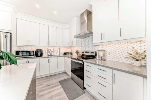 257 Carrington Way Nw, Calgary, AB - Indoor Photo Showing Kitchen With Upgraded Kitchen