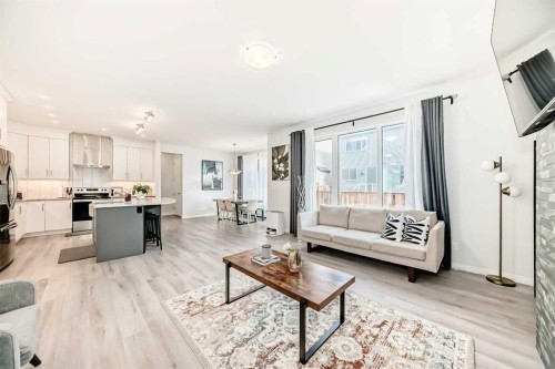 257 Carrington Way Nw, Calgary, AB - Indoor Photo Showing Living Room