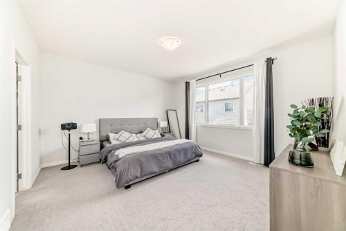 257 Carrington Way Nw, Calgary, AB - Indoor Photo Showing Bedroom