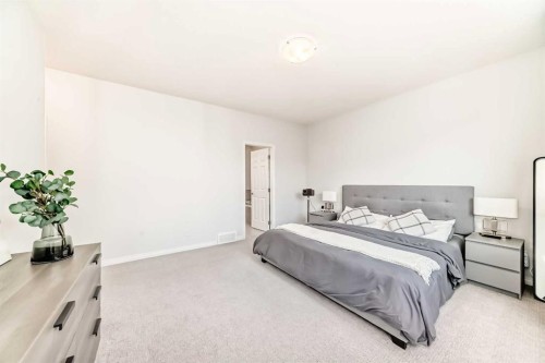 257 Carrington Way Nw, Calgary, AB - Indoor Photo Showing Bedroom