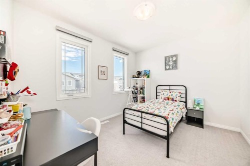 257 Carrington Way Nw, Calgary, AB - Indoor Photo Showing Bedroom