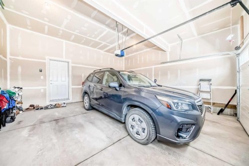 257 Carrington Way Nw, Calgary, AB - Indoor Photo Showing Garage