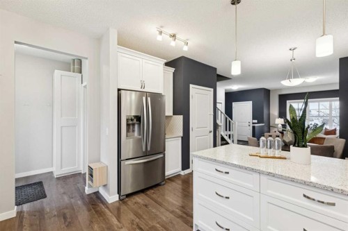 98 Magnolia Square Se, Calgary, AB - Indoor Photo Showing Kitchen With Upgraded Kitchen