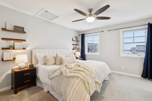 98 Magnolia Square Se, Calgary, AB - Indoor Photo Showing Bedroom