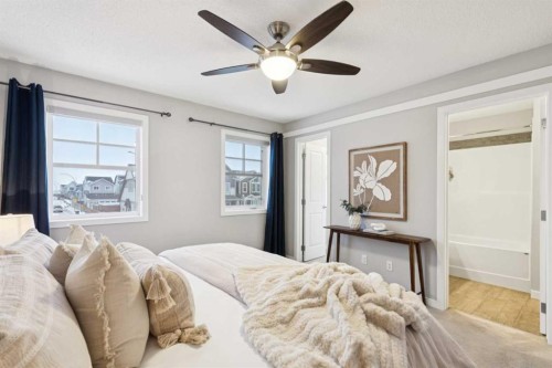 98 Magnolia Square Se, Calgary, AB - Indoor Photo Showing Bedroom